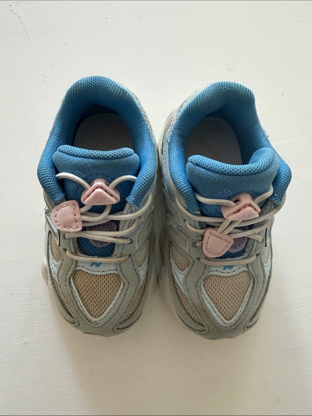New Balance Kids Light Blue and Pink Sneakers